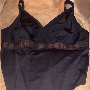 Savage ex Finity bodysuit black with gold writing